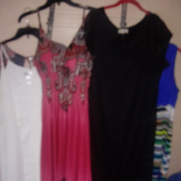 Dresses and Men's shorts and Shirts - Picture 3 of 8